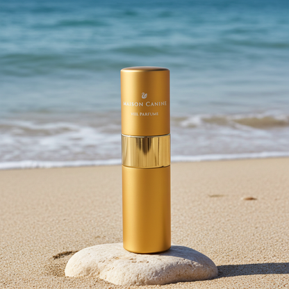Maison Canine Veil Parfumé Mini gold dog fragrance on light stone by the sea 